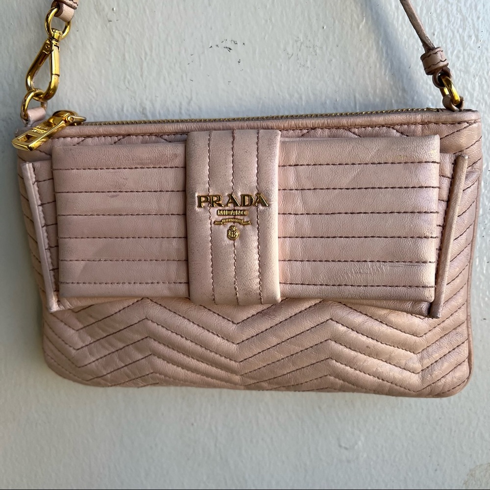 Prada Peach Wristlet with bow